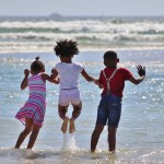 children playing at beach